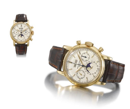 Patek Philippe. A very fine and rare 18K gold perpetual calendar chronograph wristwatch with phases of the moon