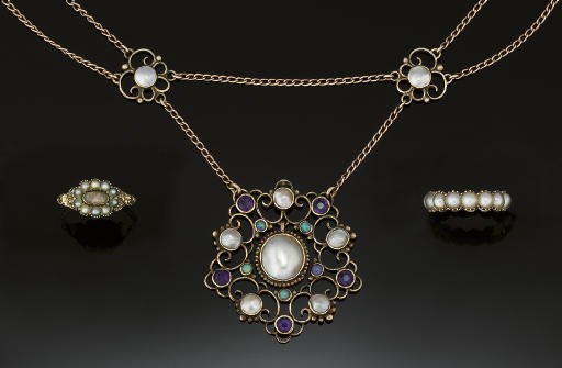 An Arts & Crafts gemstone necklace and two antique half-pearl rings