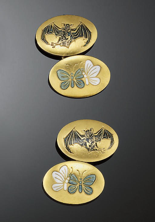 A pair of late 19th century gold and enamel cufflinks