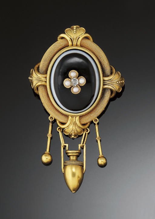 A LATE 19TH CENTURY GOLD, ONYX, HALF-PEARL AND DIAMOND BROOCH