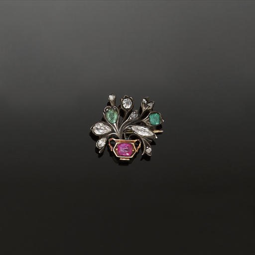 An early 20th century diamond and gem giardinetto type brooch