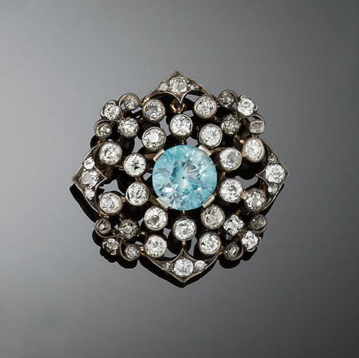 A LATE 19TH CENTURY DIAMOND AND ZIRCON BROOCH