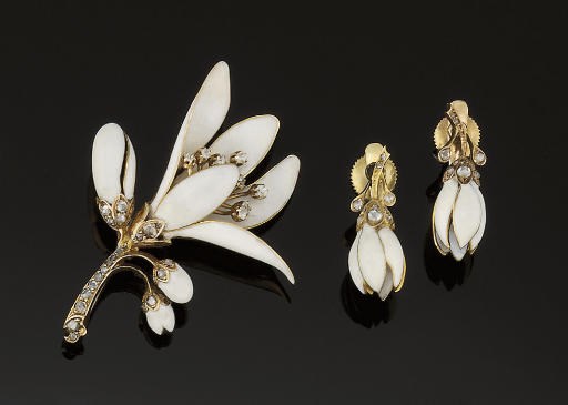 A late 19th century enamel and diamond bangle brooch and earclips