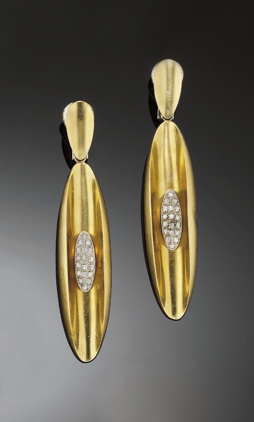A pair of diamond ear pendants