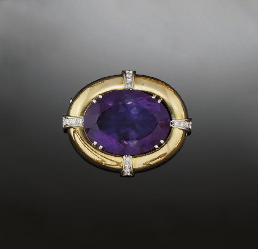 An amethyst and diamond brooch
