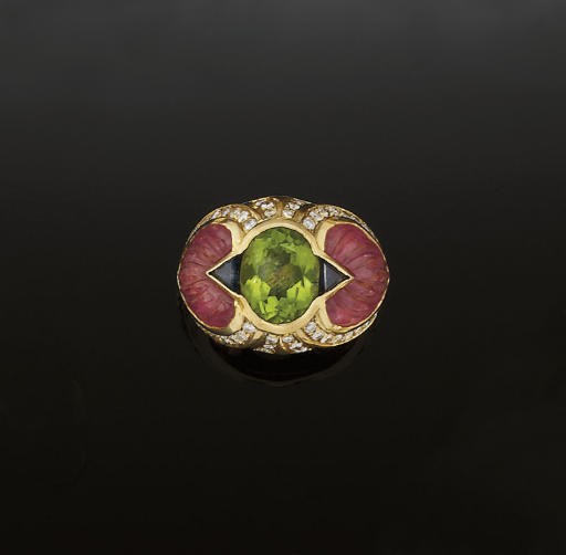 A peridot, tourmaline, sapphire and diamond ring