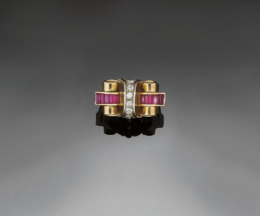 A gold, ruby and diamond cocktail ring
