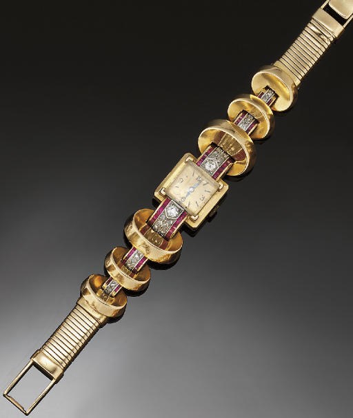 A lady's gold, diamond and synthetic ruby set cocktail watch