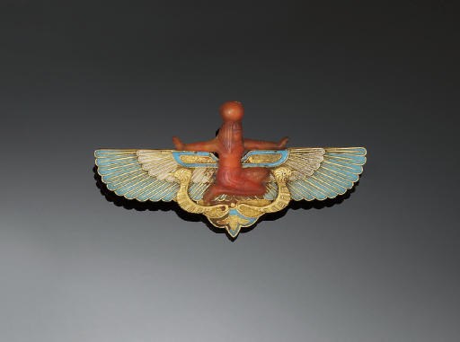 A LATE 19TH CENTURY EGYPTIAN REVIVAL GOLD, CORNELIAN AND ENAMEL BROOCH