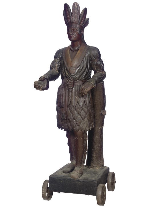 A CARVED AND PAINTED TOBACCONIST FIGURE OF AN INDIAN WARRIOR