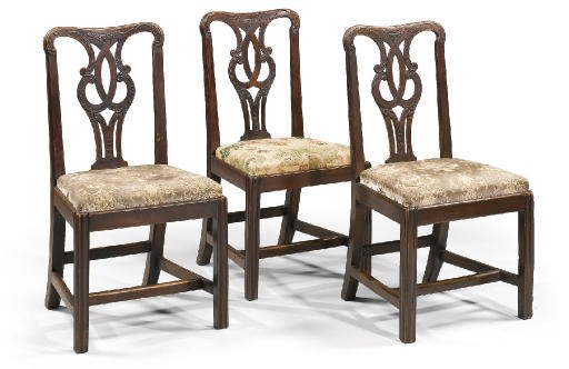 A SET OF THREE GEORGE III PROVINCIAL FRUITWOOD SIDE CHAIRS