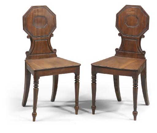 A PAIR OF REGENCY MAHOGANY HALL CHAIRS