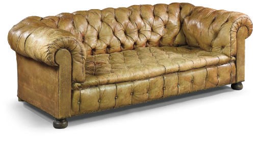 A PAIR OF RED LEATHER UPHOLSTERED CHESTERFIELD SOFAS