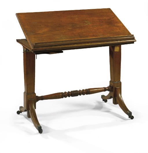 A GEORGE IV MAHOGANY LIBRARY READING TABLE