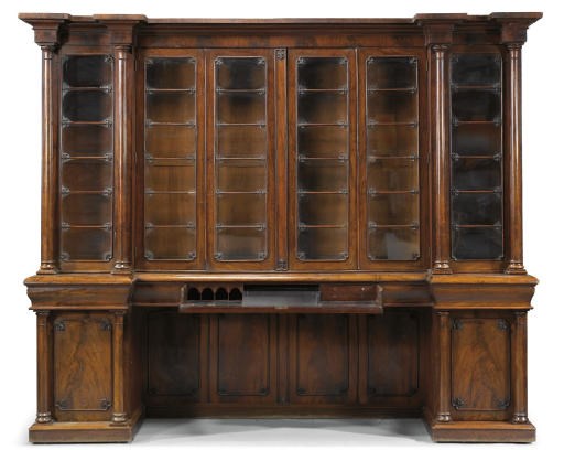A WILLIAM IV MAHOGANY BREAKFRONT SECRETAIRE BOOKCASE