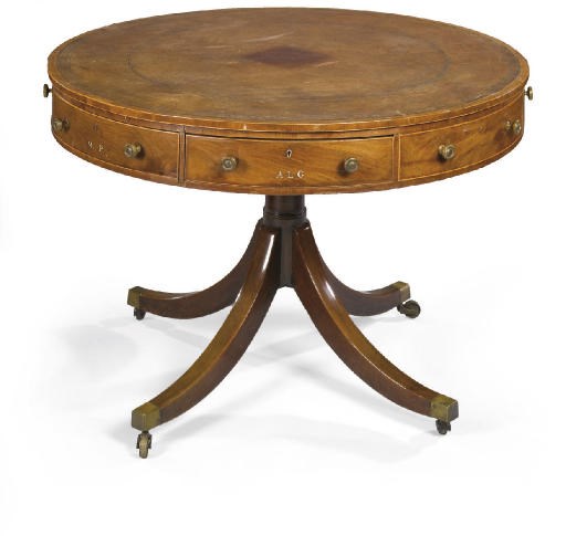 A REGENCY MAHOGANY DRUM TABLE