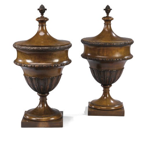 A PAIR OF EDWARDIAN MAHOGANY URNS
