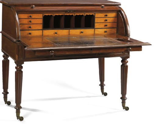 AN EARLY VICTORIAN MAHOGANY CYLINDER BUREAU