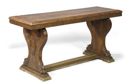 AN ITALIAN WALNUT CENTRE TABLE