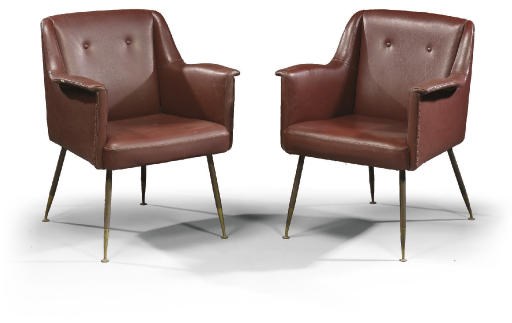 A SET OF THREE ITALIAN LEATHERETTE UPHOLSTERED LOUNGE CHAIRS