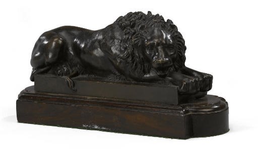 AN ITALIAN BRONZE MODEL OF A RECUMBENT LION