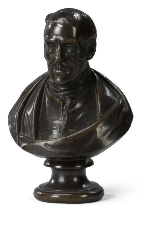 A BRONZE BUST OF A GENTLEMAN