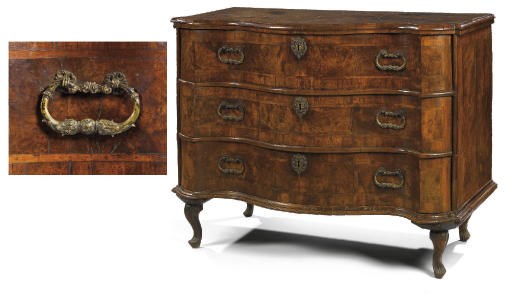A NORTH ITALIAN WALNUT SERPENTINE COMMODE