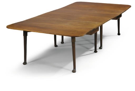 A GEORGE II MAHOGANY DINING TABLE