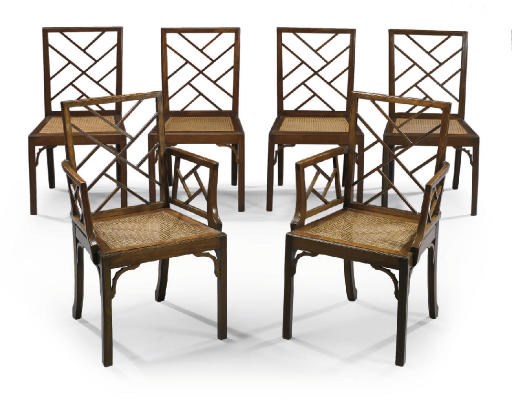 A SET OF EIGHT WALNUT DINING CHAIRS