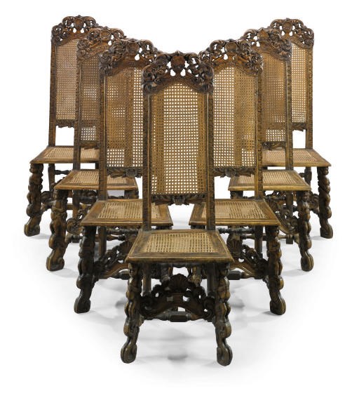 A SET OF EIGHT ITALIAN WALNUT AND CANED CHAIRS