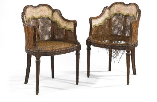 A PAIR OF NORTH ITALIAN MAHOGANY AND CANED BERGERES