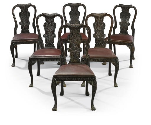 A SET OF SIX CARVED MAHOGANY DINING CHAIRS