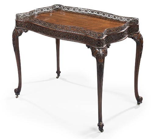 A MAHOGANY FRETWORK CENTRE TABLE