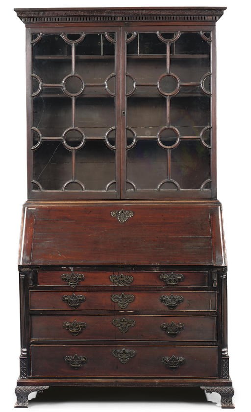 AN EARLY GEORGE III MAHOGANY BUREAU-CABINET
