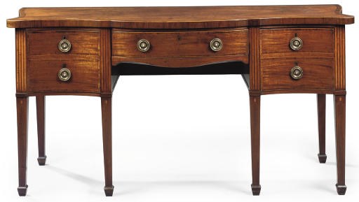 A GEORGE III BRASS-MOUNTED MAHOGANY SERPENTINE SIDEBOARD