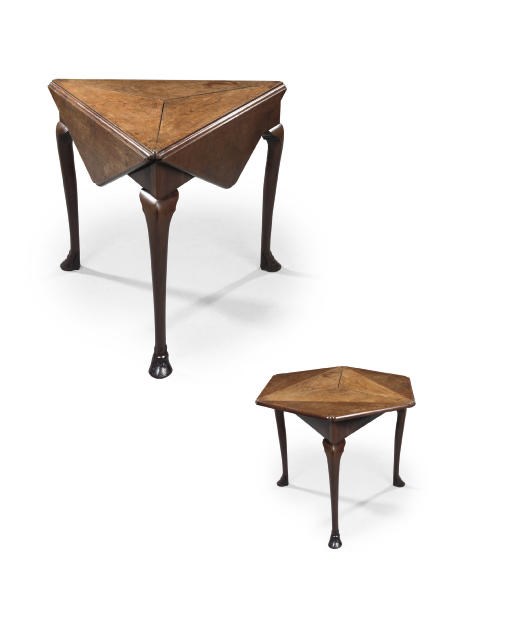 A GEORGE II MAHOGANY TRIANGULAR DROP-LEAF TABLE