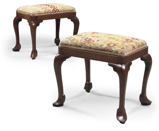 A PAIR OF GEORGE II WALNUT STOOLS
