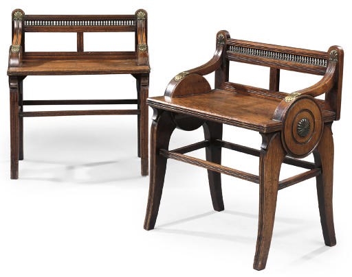 A MATCHED PAIR OF LATE VICTORIAN OAK HALL BENCHES