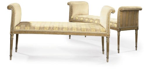 A PAIR OF GEORGE III WHITE-PAINTED AND PARCEL-GILT CURVED WINDOW SEATS