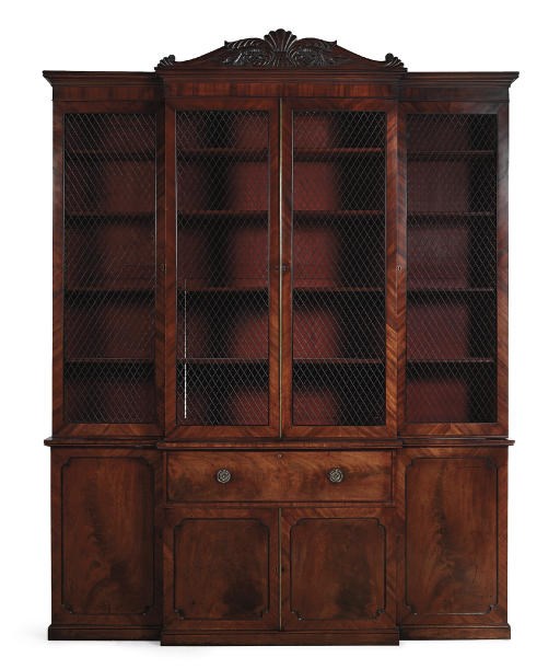 A REGENCY BRASS-MOUNTED MAHOGANY BREAKFRONT SECRETAIRE-BOOKCASE