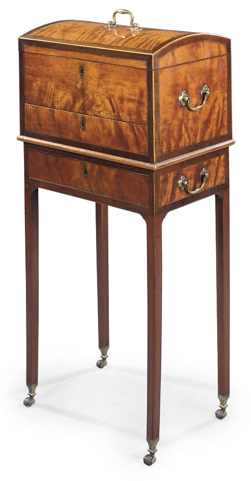 A GEORGE III SATINWOOD AND AMARANTH SMALL COFFER-ON-STAND