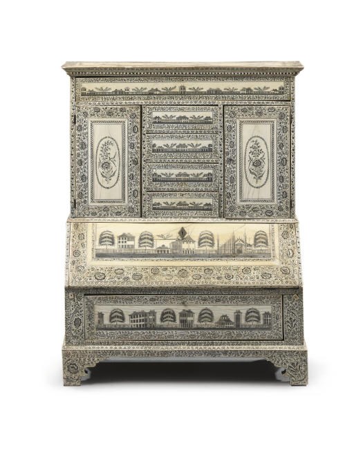 AN INDIAN ENGRAVED-IVORY SMALL BUREAU-CABINET