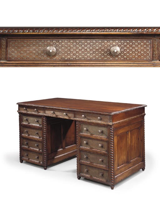 AN INDIAN BRASS-INLAID PADOUK PEDESTAL DESK