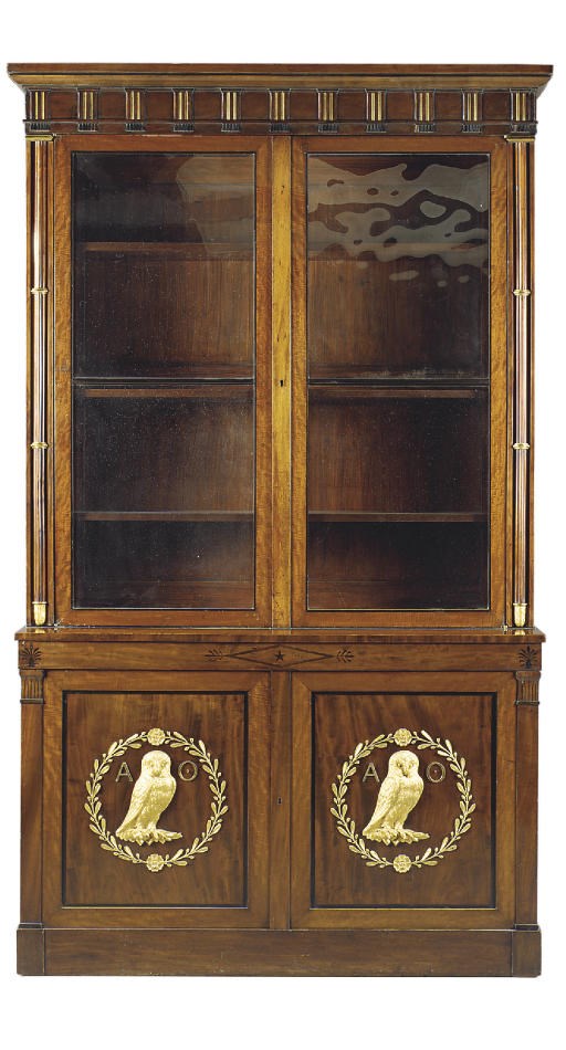 A REGENCY ORMOLU-MOUNTED MAHOGANY, EBONISED AND PARCEL-GILT BOOKCASE