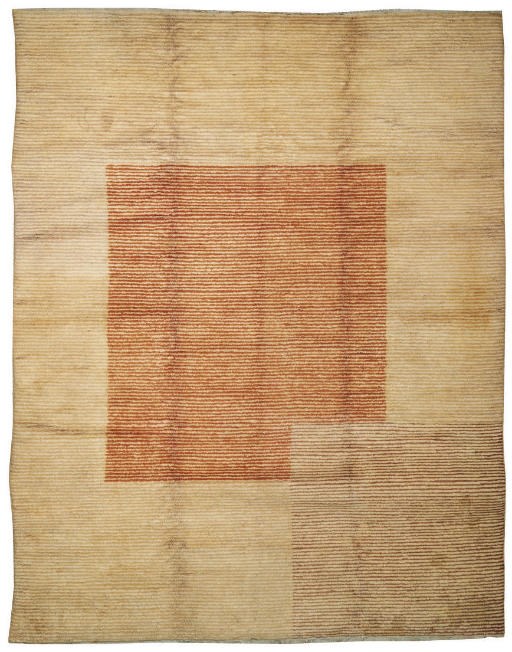 A WOVEN WOOLLEN CARPET