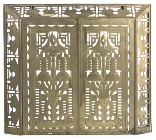 AN AUSTRO-HUNGARIAN BRASS FIRE SURROUND