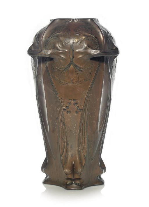 A LARGE WHITE-METAL TWIN-HANDLED VASE, C1900
