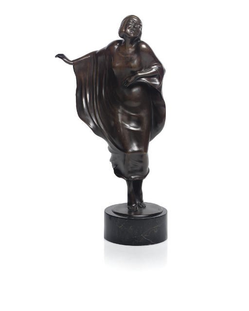 A PATINATED BRONZE OF A WOMAN
