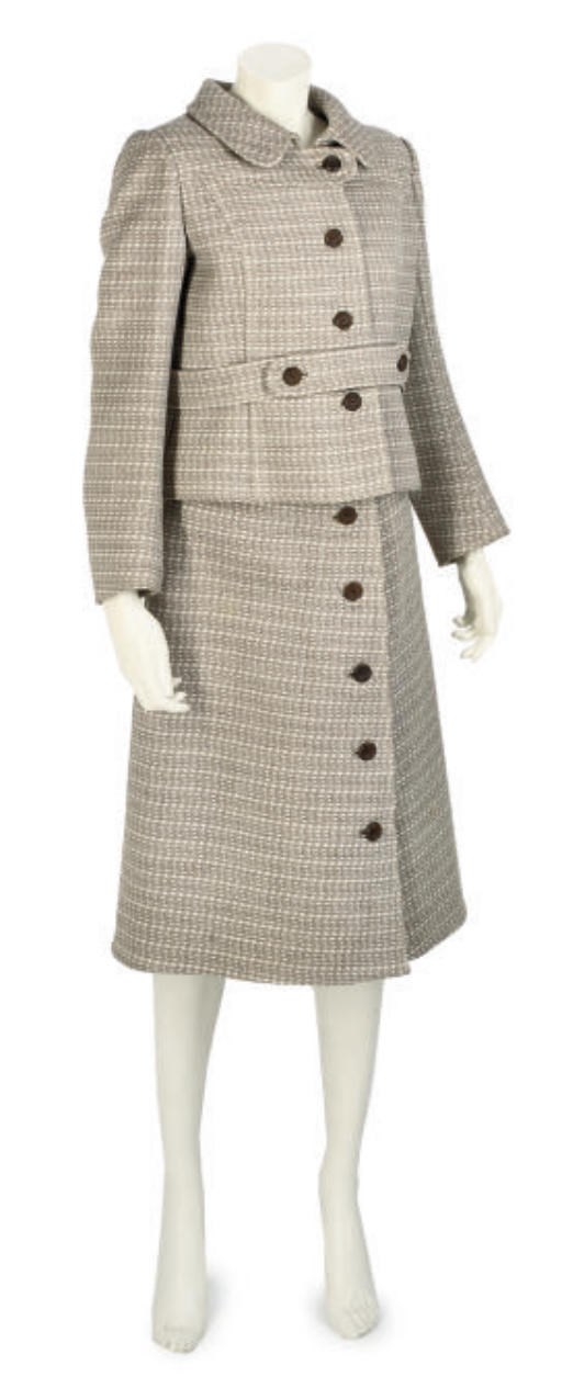 COURREGES SUIT, CHANEL BELT, DALI BROOCH