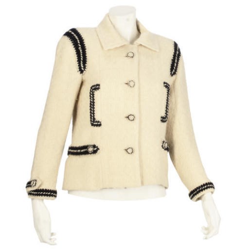 CHANEL COUTURE, A CREAM AND BLACK JACKET